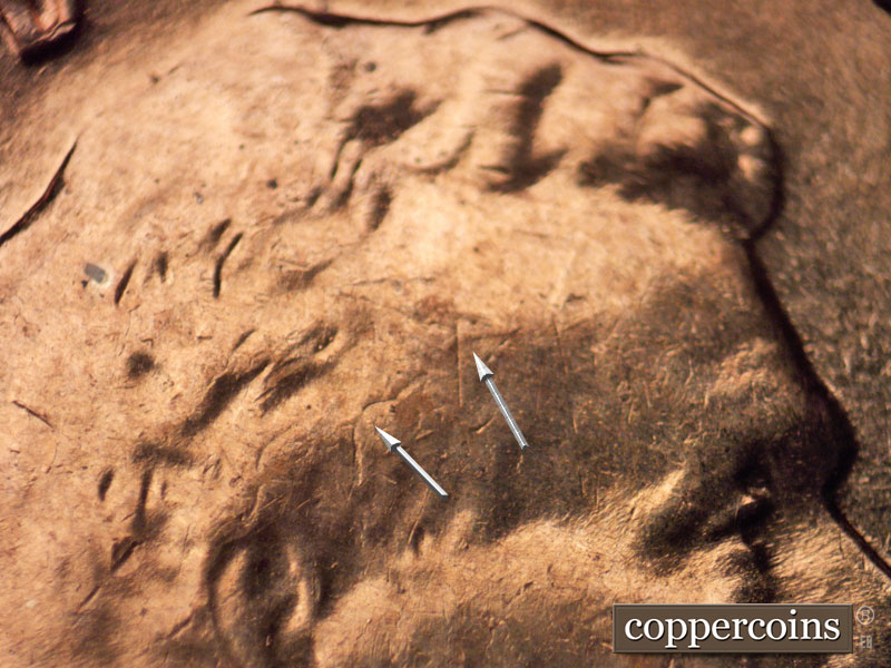 Die-stage C marker on 1960D•1MM•043 showing Obverse Die crack from hair into forehead.