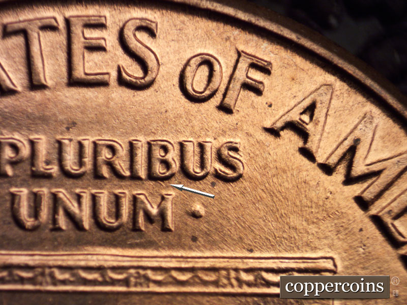 Die-stage C marker on 1960D•1MM•043 showing Small die gouge from bottom of B in PLURIBUS.