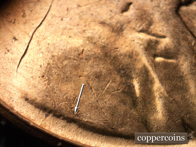 Die-stage C marker on 1960D•1MM•046 showing Die crack over VDB.