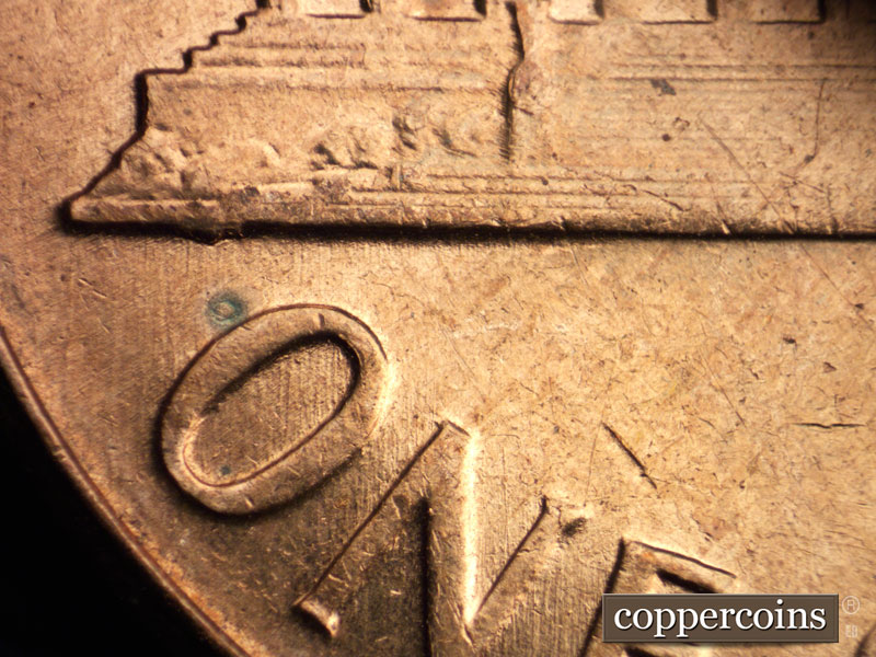Die-stage C marker on 1960D•1MM•046 showing Light N/S die scratches from base through ON in ONE.