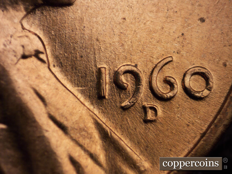 Die-stage C marker on 1960D•1MM•047 showing Die scratches through 19 in date. Die clash west of 1 in date.