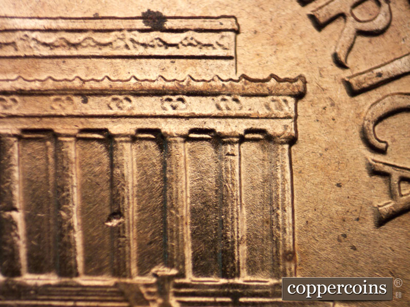 Die-stage C marker on 1960D•1MM•047 showing Right cornice area.