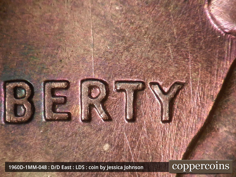 Die-stage C marker on 1960D•1MM•048 showing A number of die scratches show in and around LIBERTY. Of note are two heavier die scratches that run E-W between the….