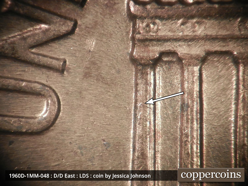 Die-stage C marker on 1960D•1MM•048 showing Die crack on column 1.
