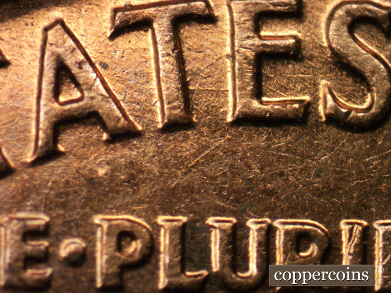 Die-stage A marker on 1960D•1MM•049 showing E/W die scratch connects TE in STATES.