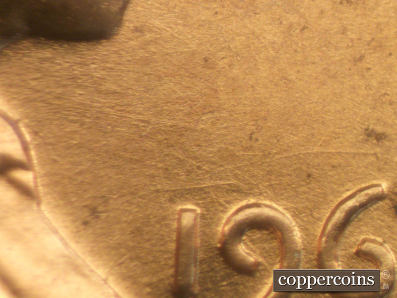 Die-stage B marker on 1960D•1MM•050 showing ESE die scratches from throat.