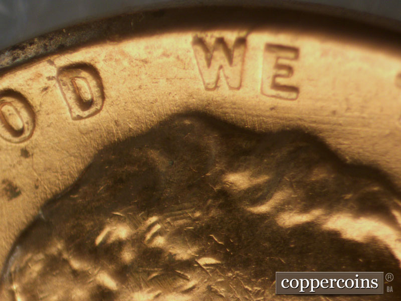 Die-stage B marker on 1960D•1MM•050 showing Generally E/W die scratch under WE.