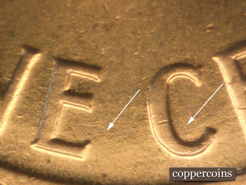 Die-stage B marker on 1960D•1MM•050 showing Light ENE die scratches start at E in ONE and go through C in CENT.