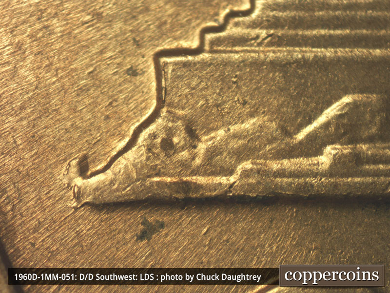 Die-stage C marker on 1960D•1MM•051 showing Die break at left base.