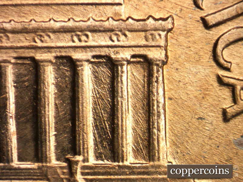 Die-stage B marker on 1960D•1MM•053 showing Die crack on column 12. Die scratches in bays 10 and 11.