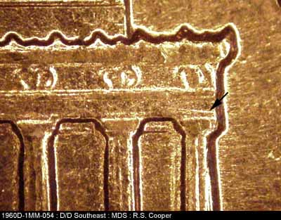 Die-stage B marker on 1960D•1MM•054 showing Light die scratch above column 12.