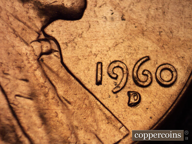 Die-stage C marker on 1960D•1MM•054 showing Strong die flow lines around date with a depression below mintmark.