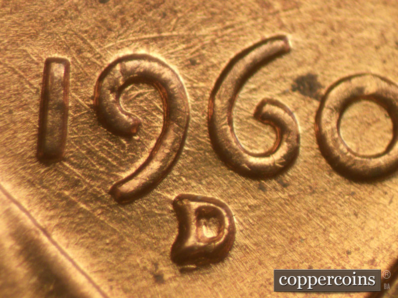 Die-stage B marker on 1960D•1MM•057 showing Closeup of repunched mint mark. Heavy die scratches through 1960.