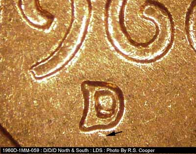 Die-stage C marker on 1960D•1MM•059 showing Closeup of repunched mint mark. A small die gouge just below the mintmark.