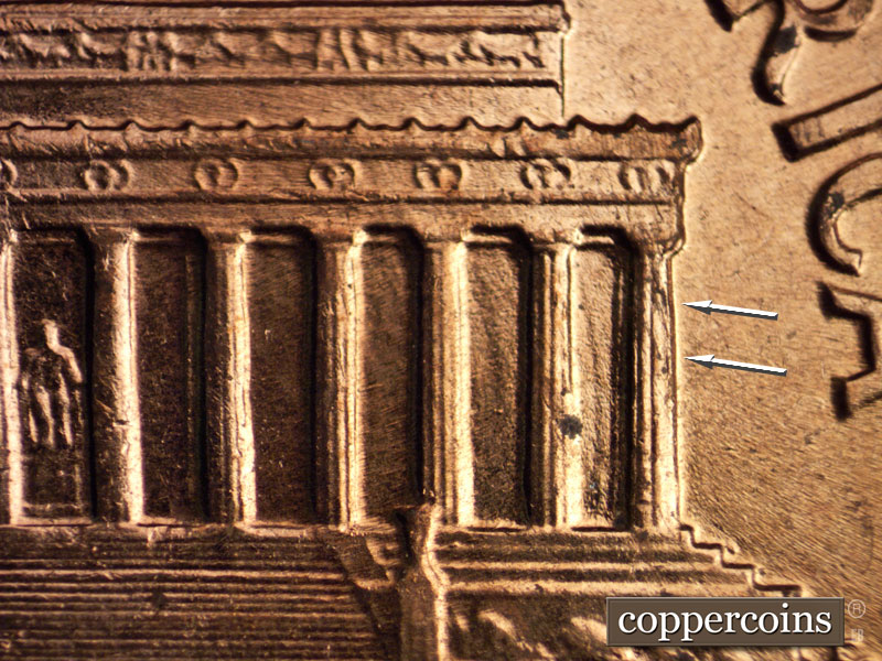 Die-stage C marker on 1960D•1MM•060 showing Die crack on column 12.