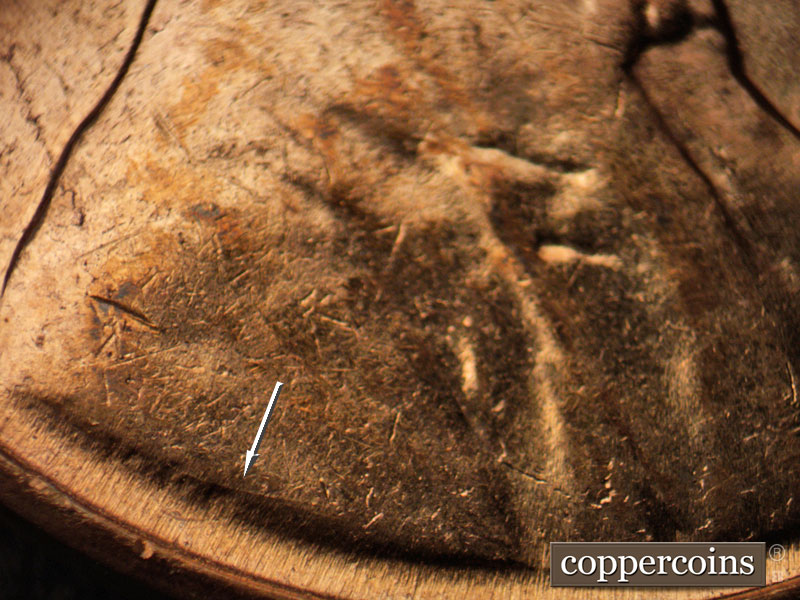 Die-stage B marker on 1960D•1MM•061 showing Die crack over VDB.