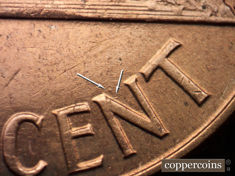 Die-stage C marker on 1960D•1MM•072 showing Two die dots in upper N in CENT.