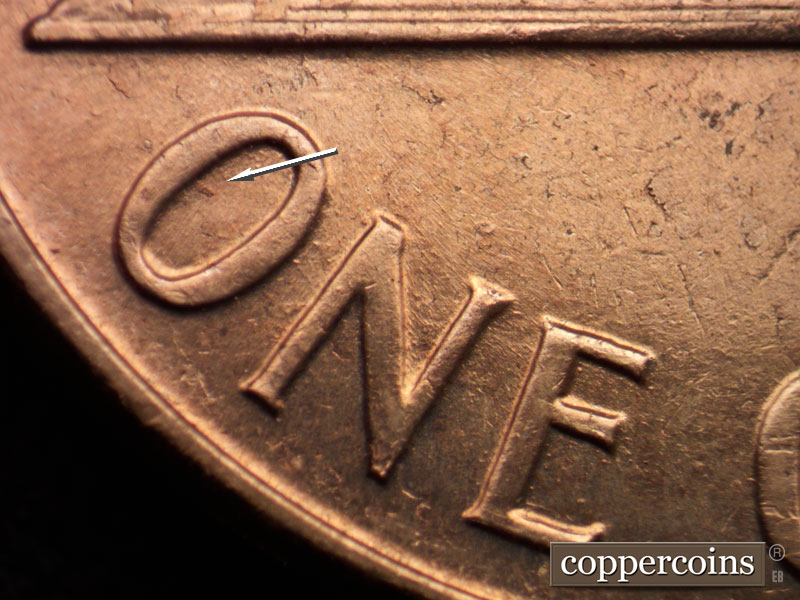 Die-stage C marker on 1960D•1MM•072 showing Small die gouge inside O in ONE. New reverse die from previous die states.