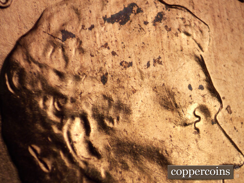 Die-stage A marker on 1960D•1MM•073 showing No die crack on forehead as seen in later stages.