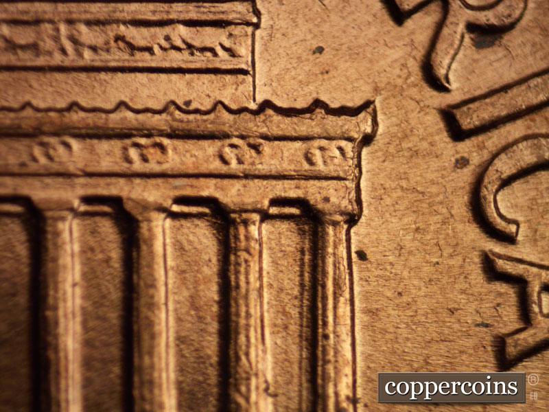 Die-stage B marker on 1960D•1MM•073 showing Die crack on right cornice down column 12.