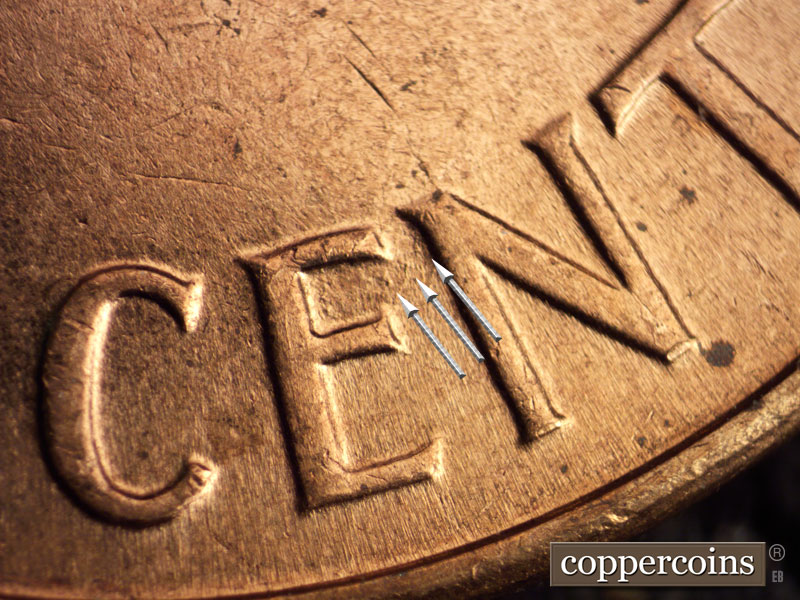 Die-stage B marker on 1960D•1MM•073 showing Three die dot between E and N in CENT. Die depression on upper left of E in CENT.