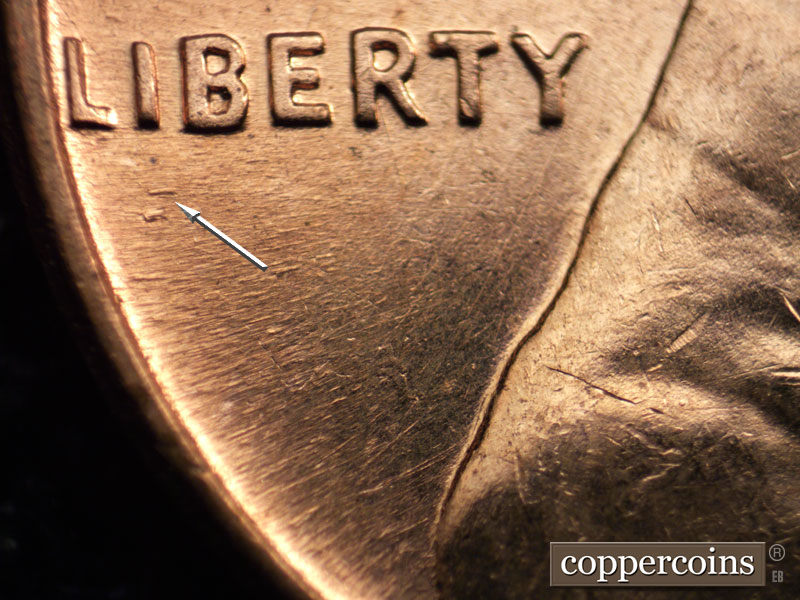 Die-stage B marker on 1960D•1MM•074 (1960 Repunched Mint Mark).