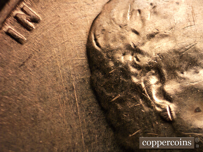 Die-stage B marker on 1960D•1MM•074 (1960 Repunched Mint Mark).