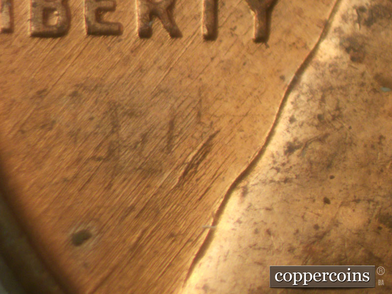 Die-stage B marker on 1960D•1MM•079 (1960 Repunched Mint Mark).