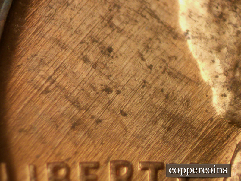 Die-stage B marker on 1960D•1MM•079 (1960 Repunched Mint Mark).