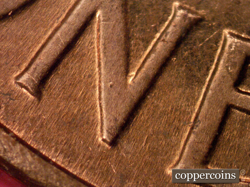 Die-stage B marker on 1960D•1MM•081 (1960 Repunched Mint Mark).