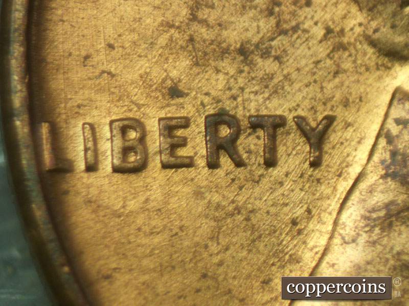 Die-stage B marker on 1960D•1MM•083 (1960 Repunched Mint Mark).
