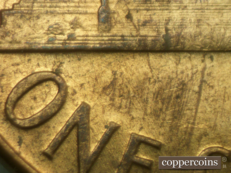 Die-stage B marker on 1960D•1MM•083 (1960 Repunched Mint Mark).