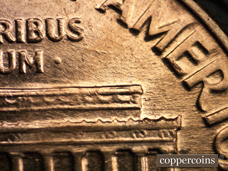 Die-stage B marker on 1960D•1MM•084 (1960 Repunched Mint Mark).