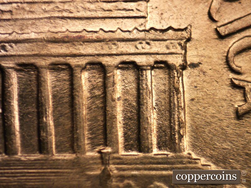 Die-stage B marker on 1960D•1MM•084 (1960 Repunched Mint Mark).