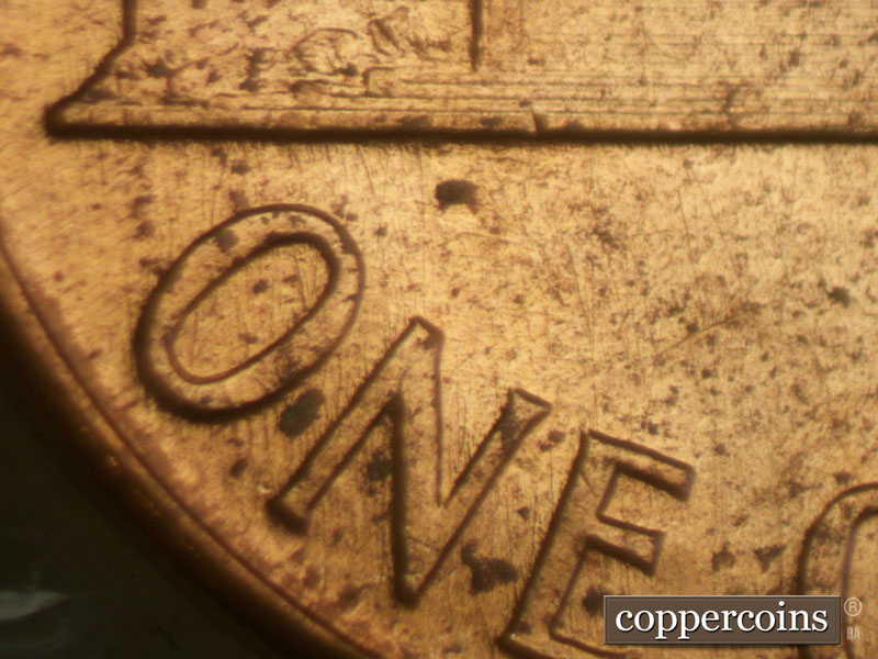 Die-stage A marker on 1960D•1MM•085 (1960 Repunched Mint Mark).