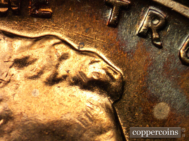 Die-stage B marker on 1960D•1MM•085 (1960 Repunched Mint Mark).
