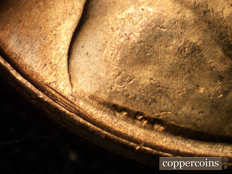 Die-stage B marker on 1960D•1MM•085 (1960 Repunched Mint Mark).