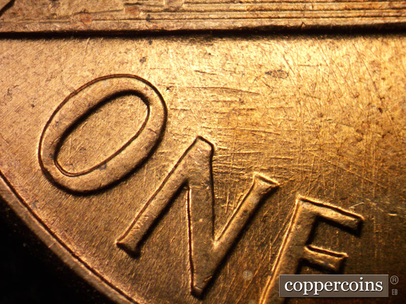 Die-stage B marker on 1960D•1MM•085 (1960 Repunched Mint Mark).