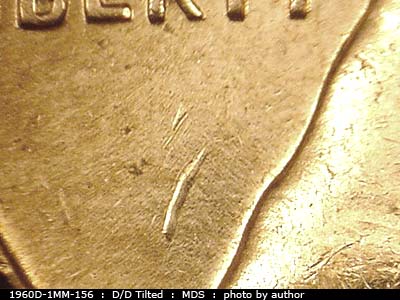 Die-stage B marker on 1960D•1MM•094 (1960 Repunched Mint Mark).