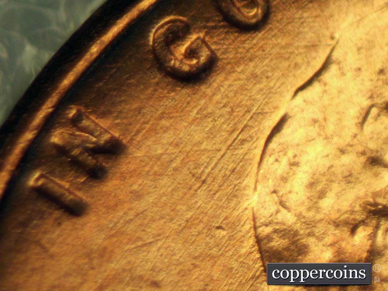 Die-stage B marker on 1960D•1MM•095 (1960 Repunched Mint Mark).