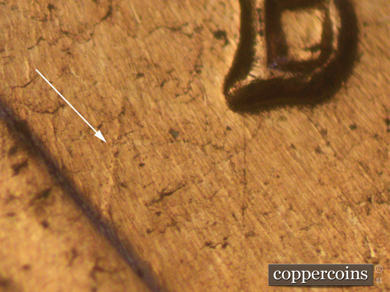 Die-stage B marker on 1960D•1MM•097 (1960 Repunched Mint Mark).