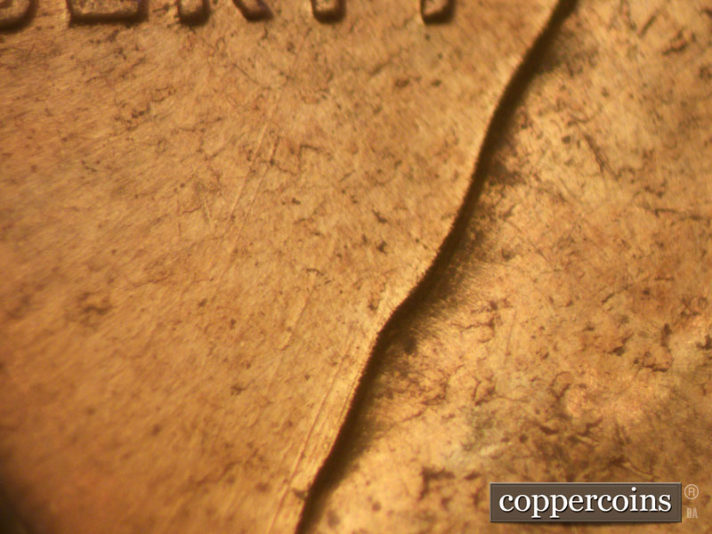 Die-stage B marker on 1960D•1MM•097 (1960 Repunched Mint Mark).