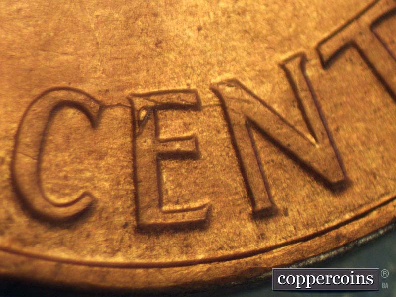 Die-stage A marker on 1960D•1MM•103 (1960 Repunched Mint Mark).