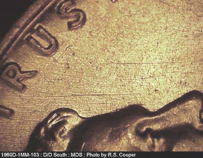 Die-stage B marker on 1960D•1MM•103 (1960 Repunched Mint Mark).