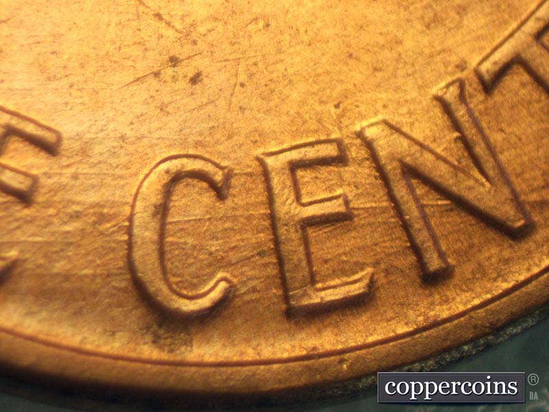 Die-stage C marker on 1960D•1MM•104 (1960 Repunched Mint Mark).