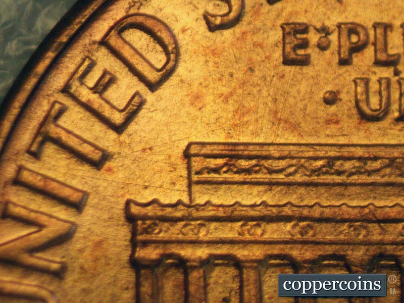 Die-stage A marker on 1960D•1MM•106 (1960 Repunched Mint Mark).