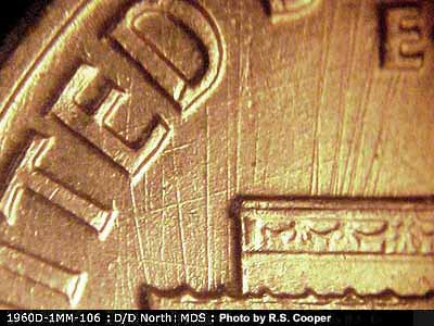 Die-stage B marker on 1960D•1MM•106 (1960 Repunched Mint Mark).