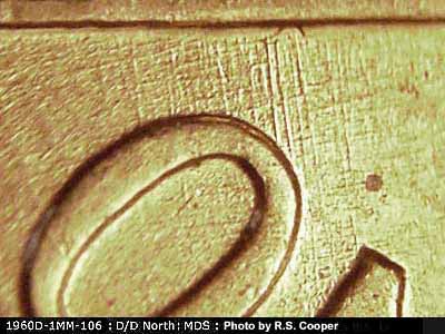 Die-stage B marker on 1960D•1MM•106 (1960 Repunched Mint Mark).
