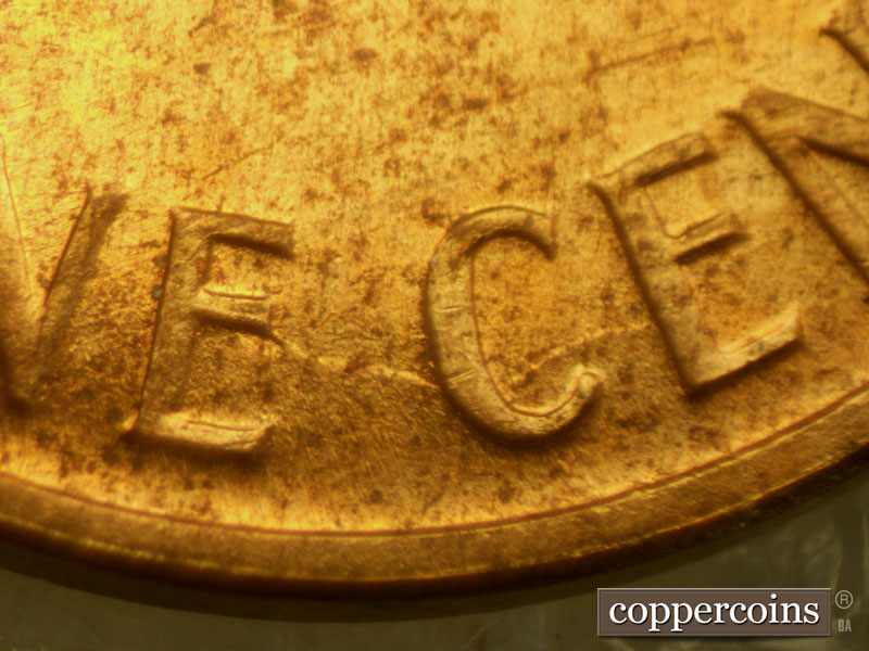 Die-stage C marker on 1960D•1MM•107 (1960 Repunched Mint Mark).