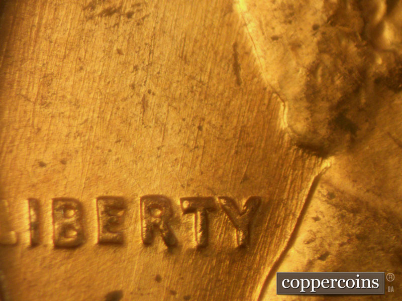 Die-stage B marker on 1960D•1MM•109 (1960 Repunched Mint Mark).